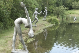 Nude women by the lake